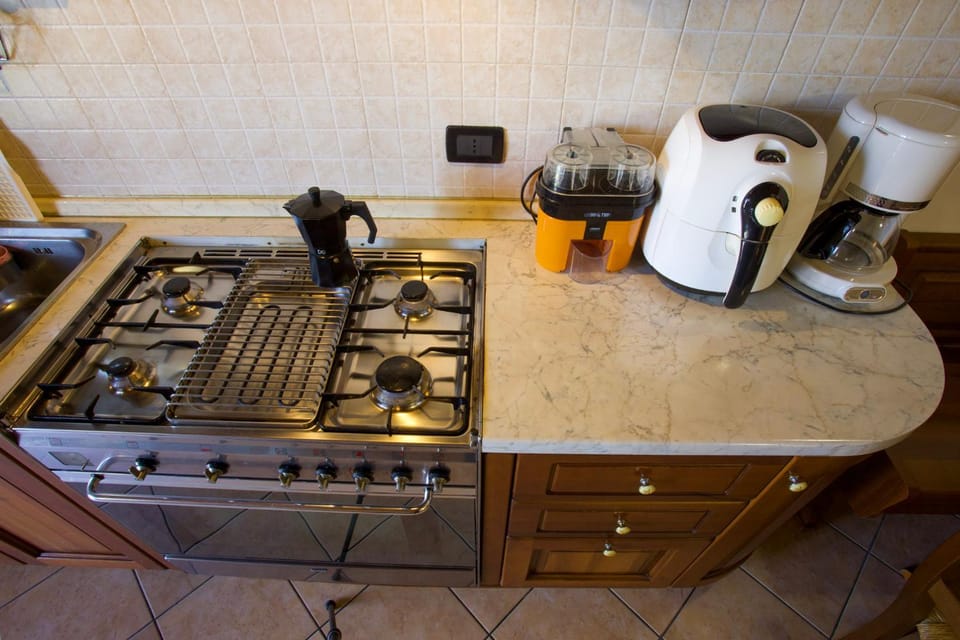 Kitchen or kitchenette, stove