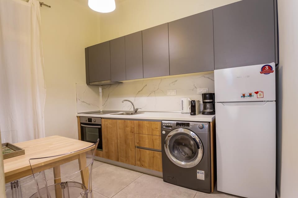 Kitchen or kitchenette, washing machine