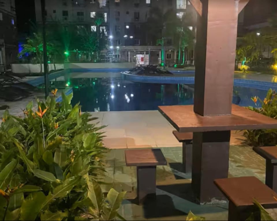Property building, Patio, Night, Pool view, Swimming pool