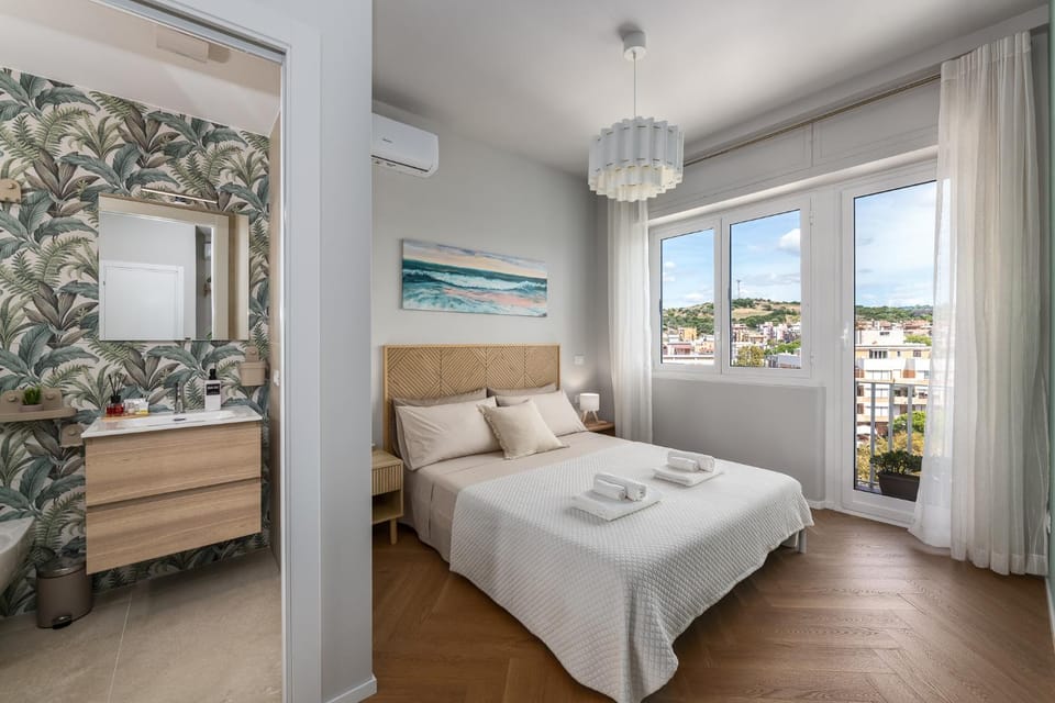 Bed, Photo of the whole room, Bedroom, towels, air conditioner