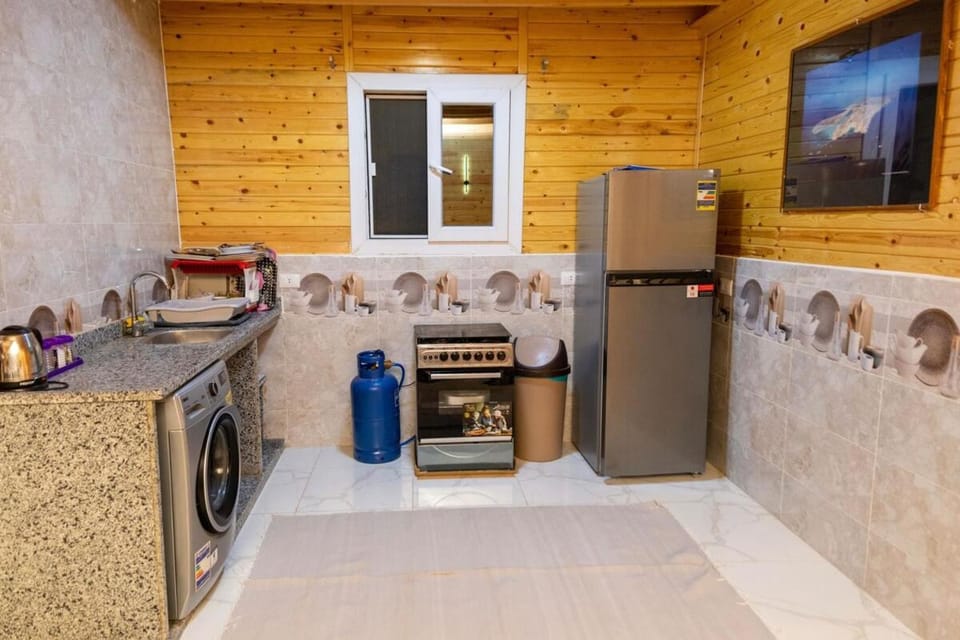 Kitchen or kitchenette, washing machine