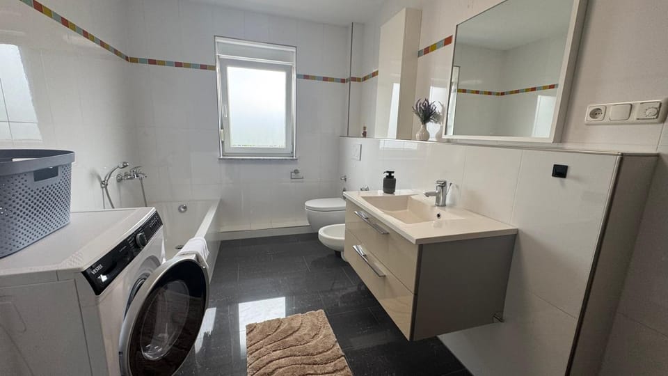 Toilet, Bathroom, Bath, bidet, towels, washing machine