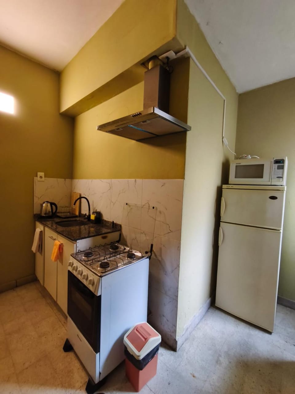 Kitchen or kitchenette, oven, stove