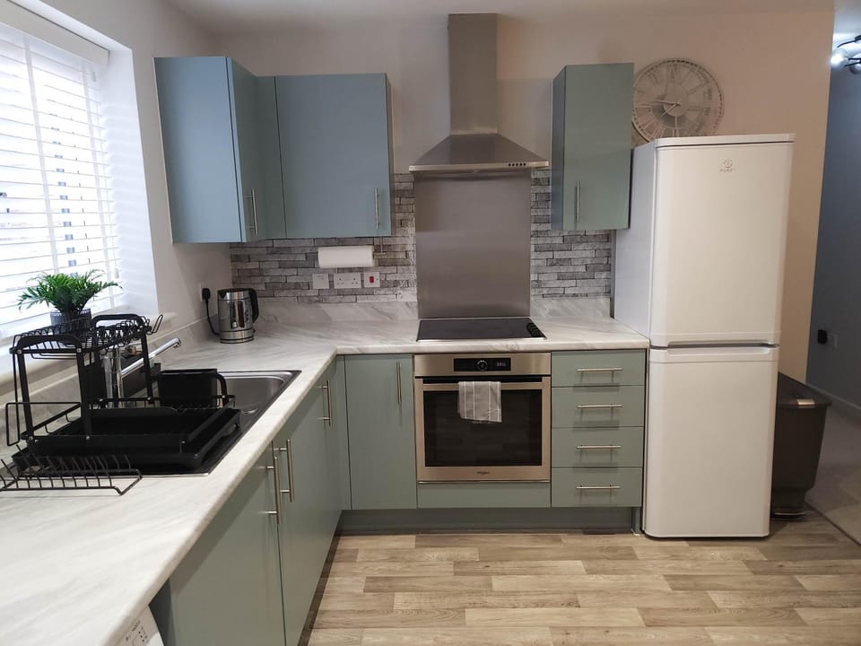 Kitchen or kitchenette, oven, stove