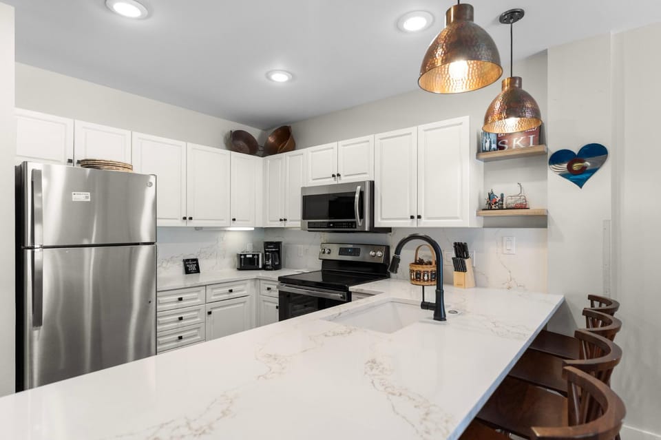 Kitchen or kitchenette, furniture, microwave, oven, stove