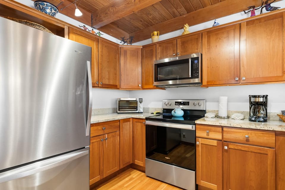 Kitchen or kitchenette, furniture, microwave, stove, kitchen