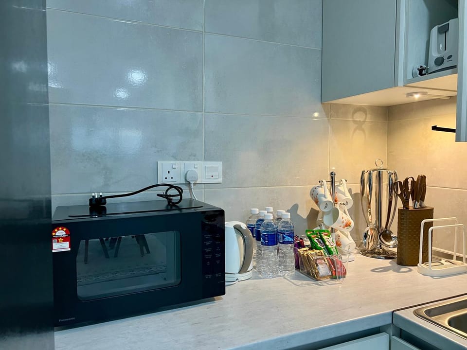 Kitchen or kitchenette, microwave