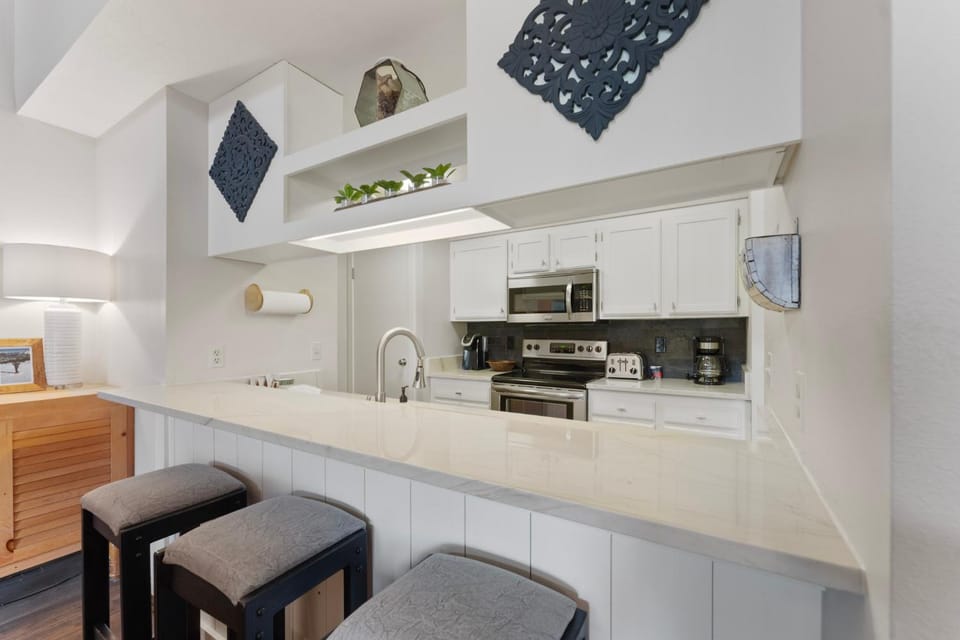 Kitchen or kitchenette, Seating area, furniture, microwave, oven, stove