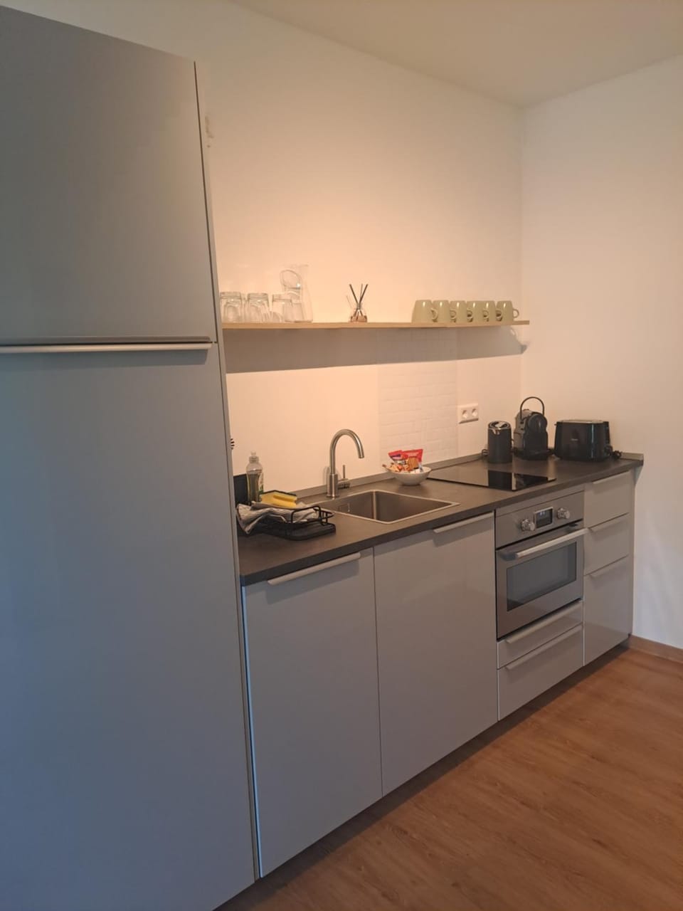 Kitchen or kitchenette, oven, stove