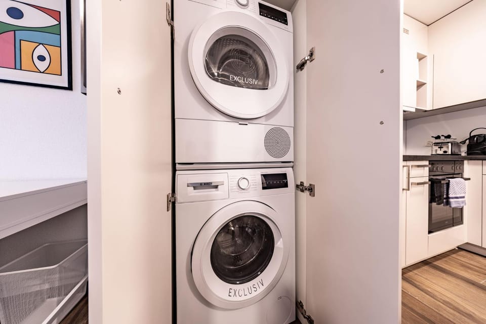 Kitchen or kitchenette, internet, laundry, washing machine, dryer