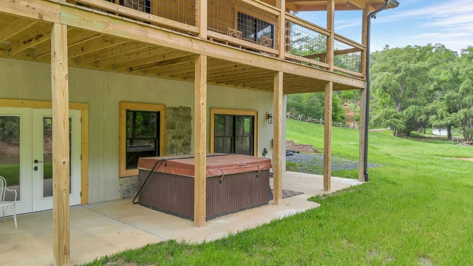 Riverstead Cabin- Riverfront, Wrap Around Porch, Hot Tub & More Cabin in North Carolina
