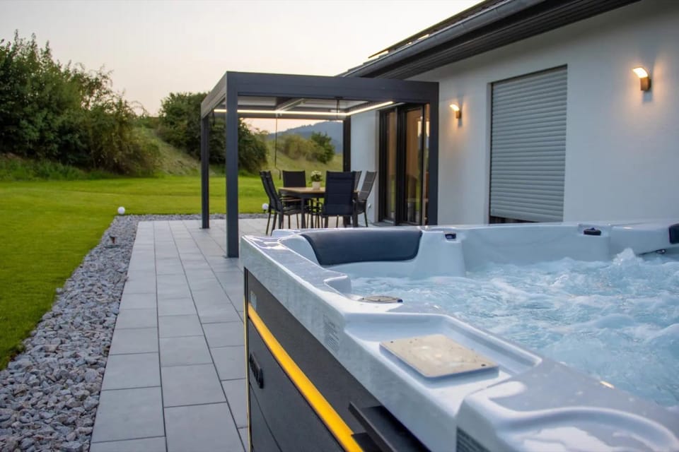 Property building, Living room, Swimming pool