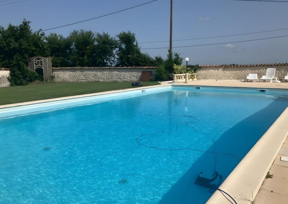 Property building, Living room, Swimming pool