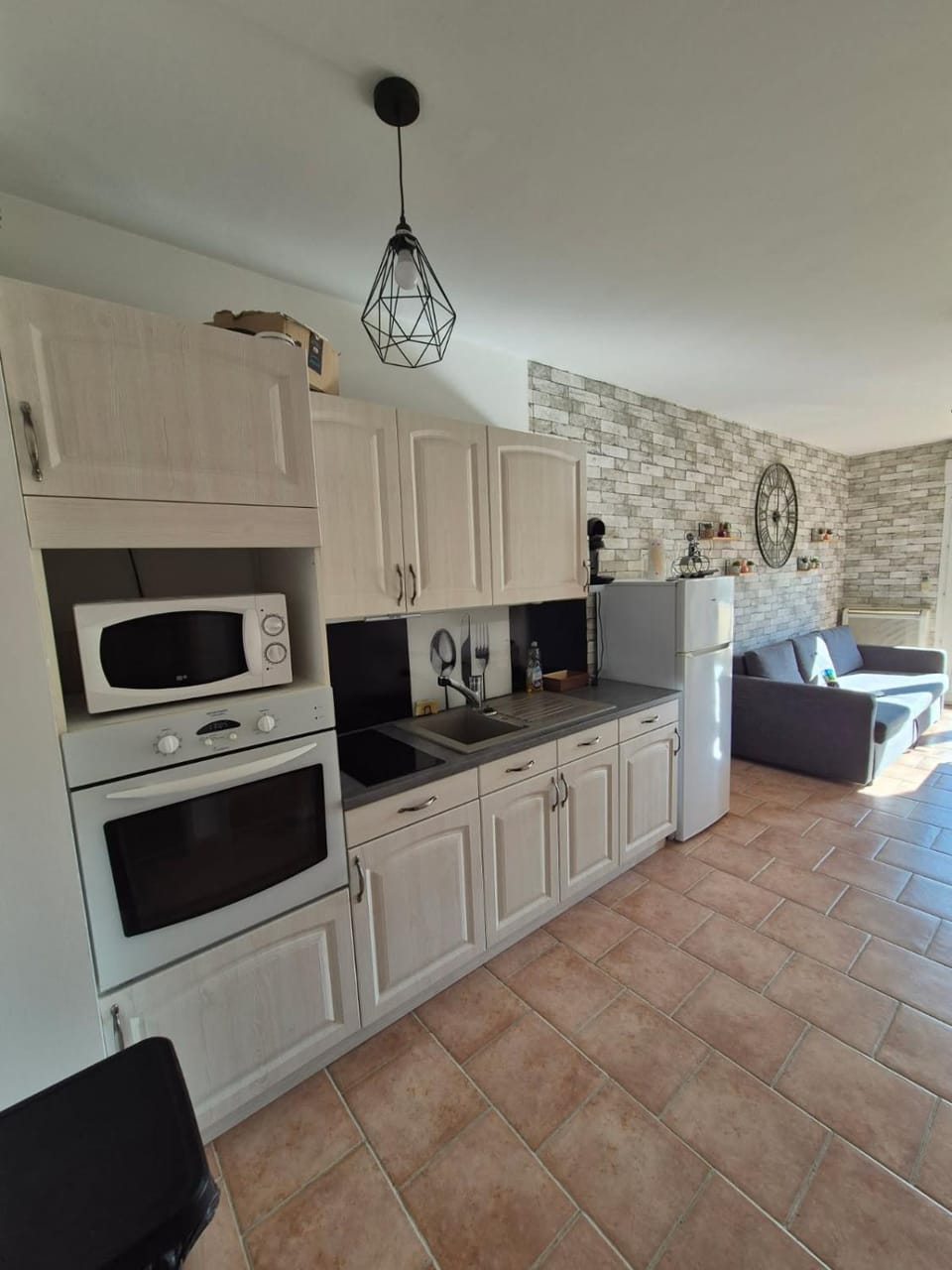 Kitchen or kitchenette, oven, stove, toaster