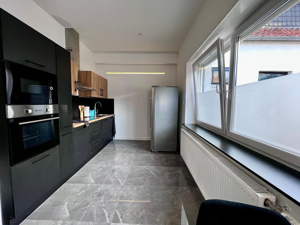 Kitchen or kitchenette, oven, stove
