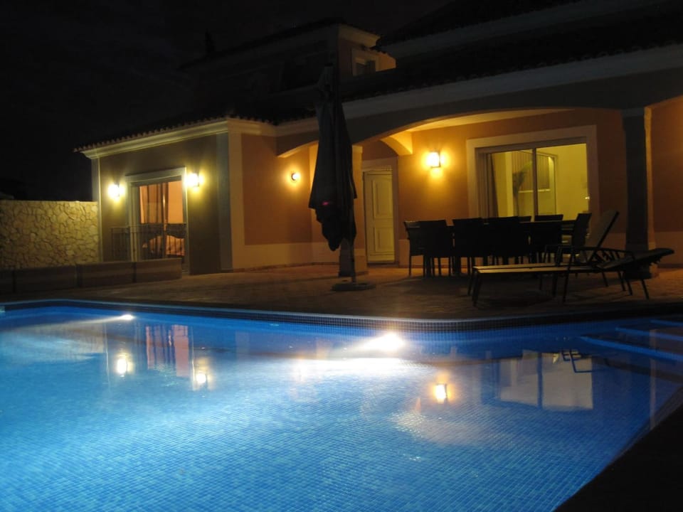 Property building, Night, Swimming pool, Swimming pool