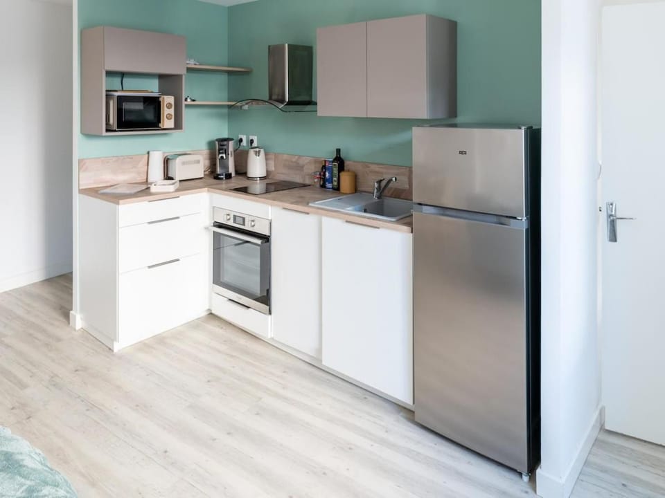 Kitchen or kitchenette, stove