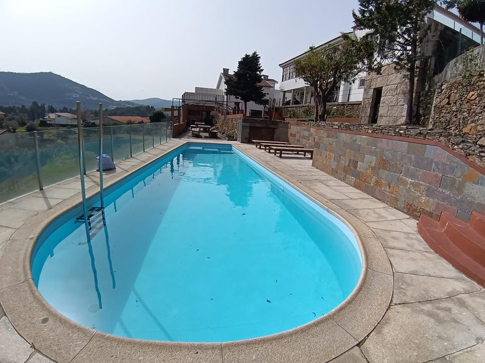 Property building, Living room, Swimming pool