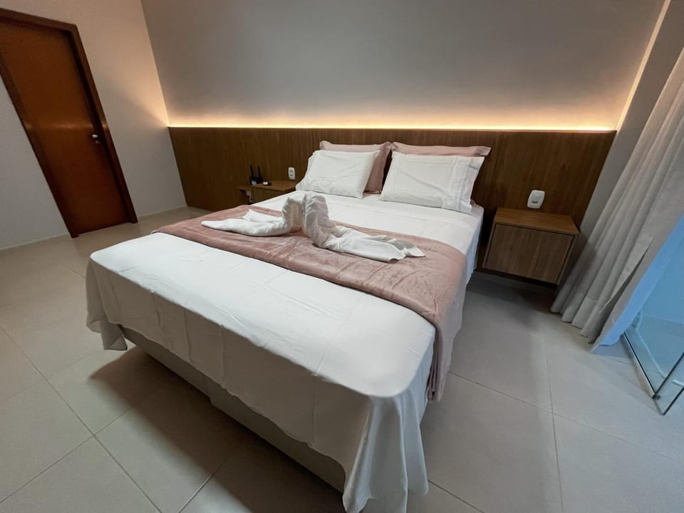 Bed, Photo of the whole room, Bedroom, towels, air conditioner