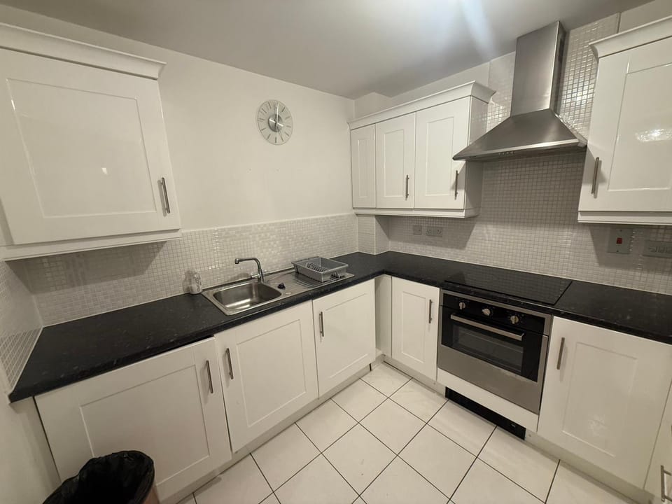 Kitchen or kitchenette, stove, toaster