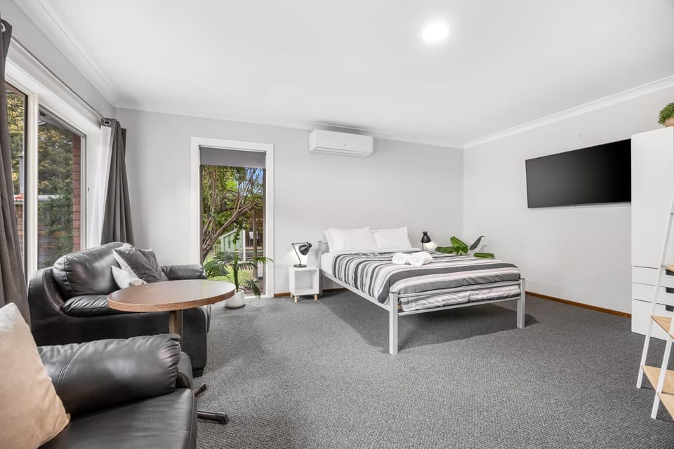 Bed, Seating area, Bedroom, wardrobe, air conditioner