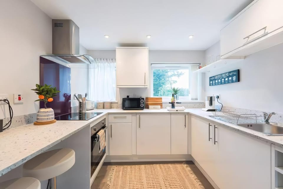 Kitchen or kitchenette, oven, stove, toaster