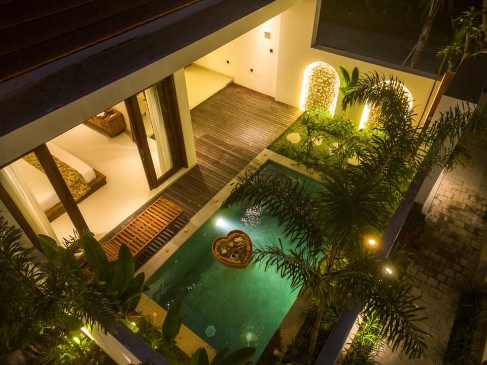 Property building, Patio, Night, Garden, Garden view, Pool view, Swimming pool