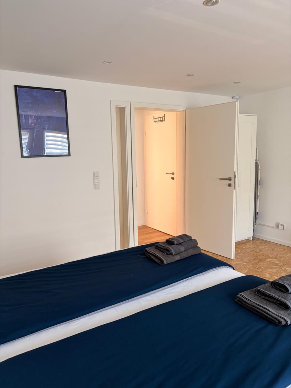 Bed, Bedroom, flat iron, towels, wardrobe