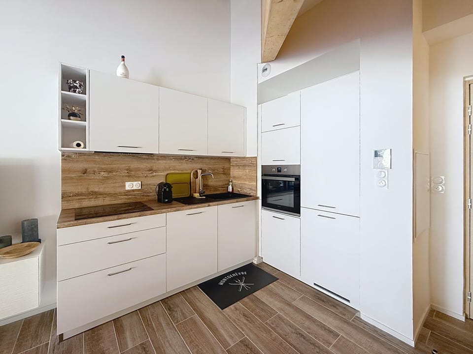 Kitchen or kitchenette, dishwasher, oven, stove, toaster