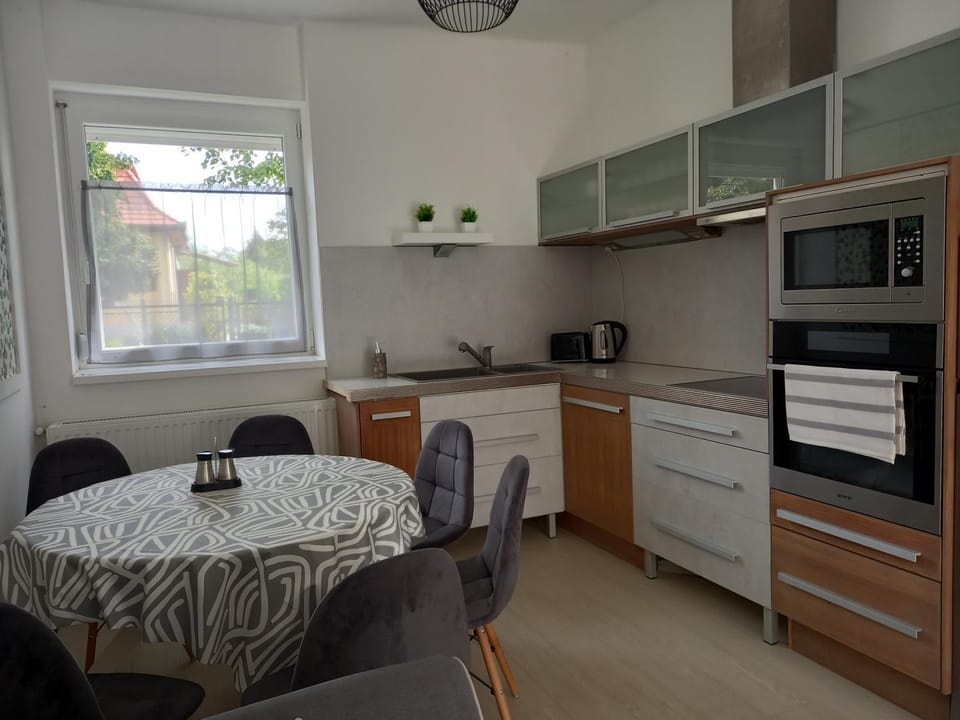 Kitchen or kitchenette, Dining area, oven, stove, toaster