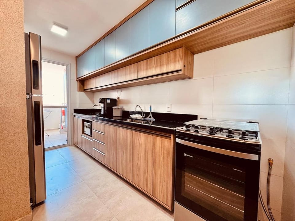 Apartamento com suíte e 2 vagas de garagem Apartment in Guarapari