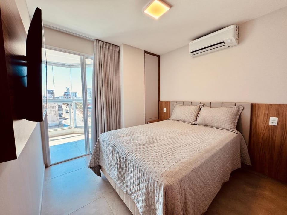 Apartamento com suíte e 2 vagas de garagem Apartment in Guarapari