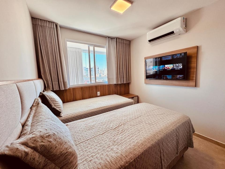 Apartamento com suíte e 2 vagas de garagem Apartment in Guarapari