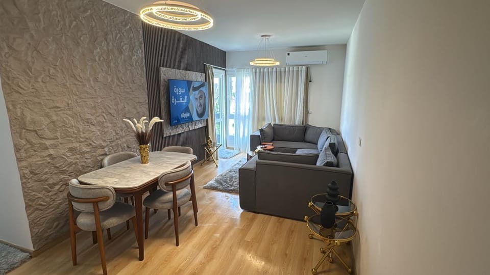 Apartment with garden inside Kian Grand Heights Compound Apartment in Egypt