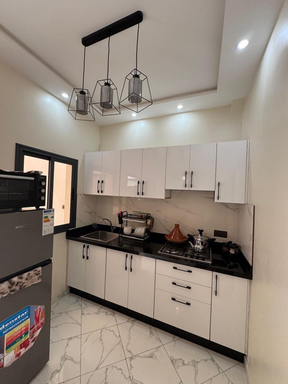 Kitchen or kitchenette, oven