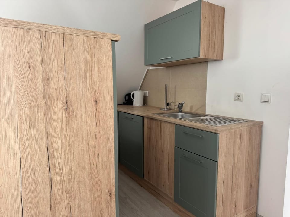 Kitchen or kitchenette, stove