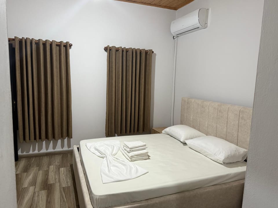 Bed, Photo of the whole room, Bedroom, towels, air conditioner