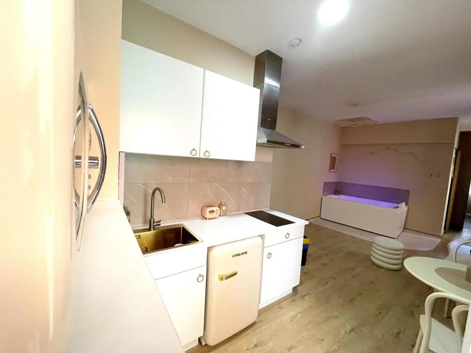Kitchen or kitchenette, stove