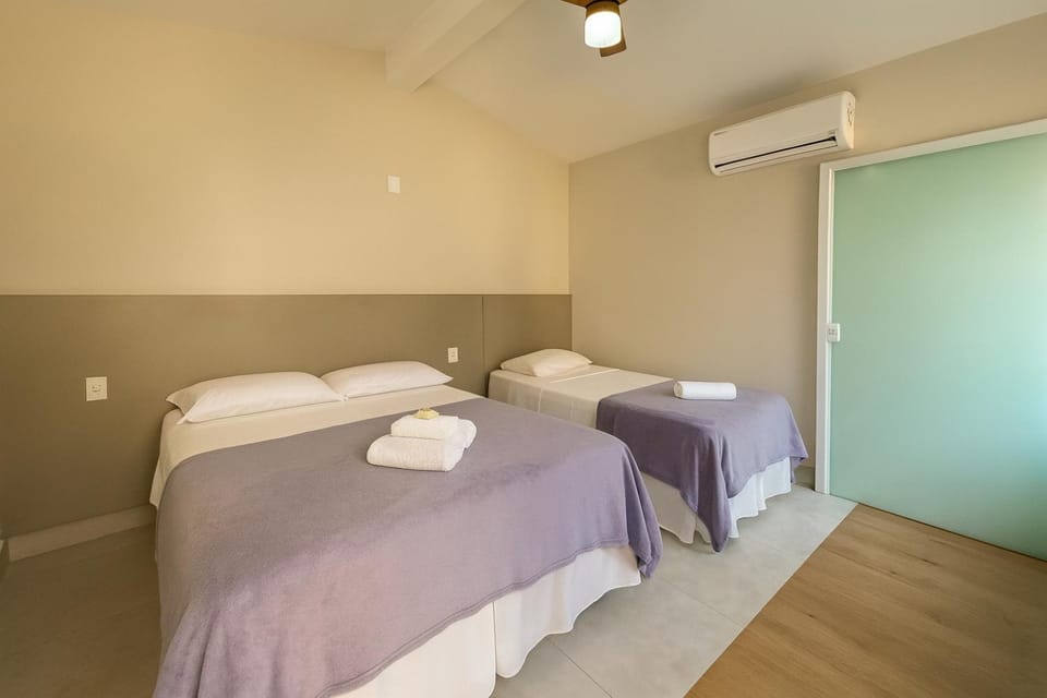 Photo of the whole room, Bedroom, towels, air conditioner