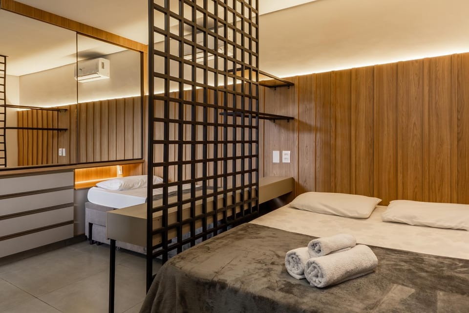 Bed, towels, wardrobe