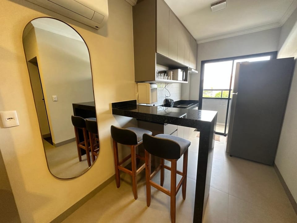 Studio Maia Aconchego e praticidade 190m da UFU Apartment in Uberlândia