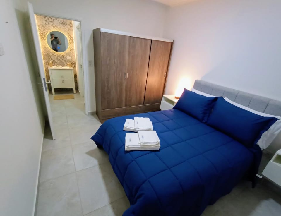 Bed, Photo of the whole room, Bedroom, towels, wardrobe
