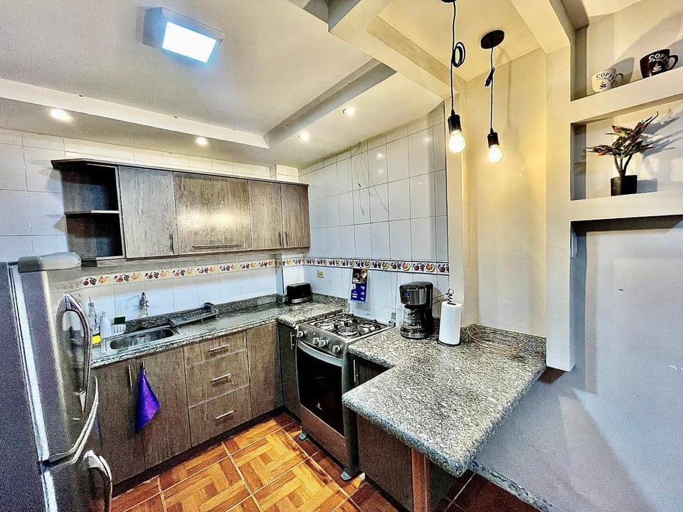 Kitchen or kitchenette, oven, toaster