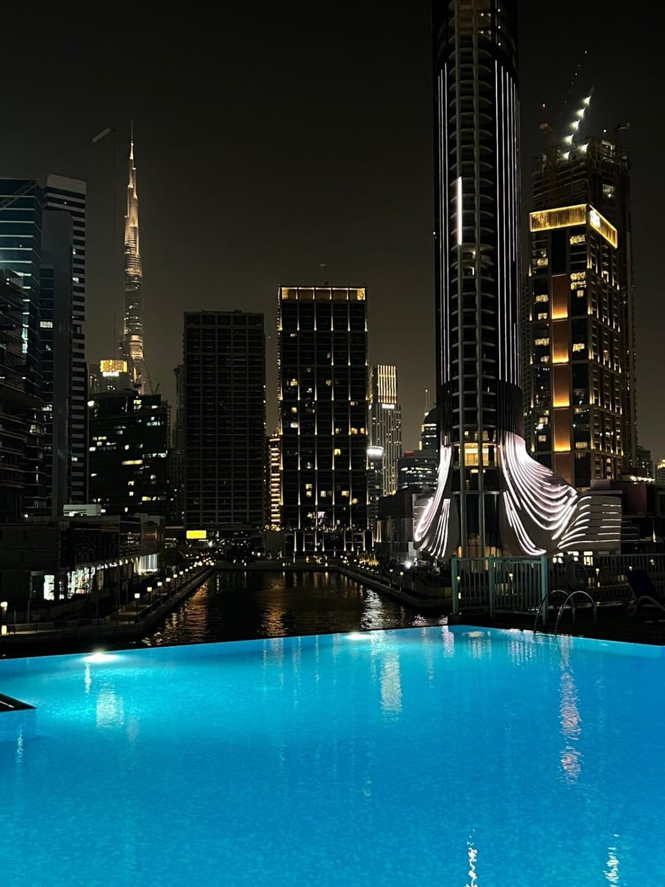 Night, View (from property/room), City view, Pool view, Swimming pool