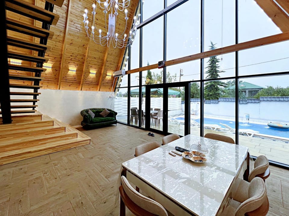 Living room, Seating area, Dining area, Pool view, Swimming pool, sunbed, towels