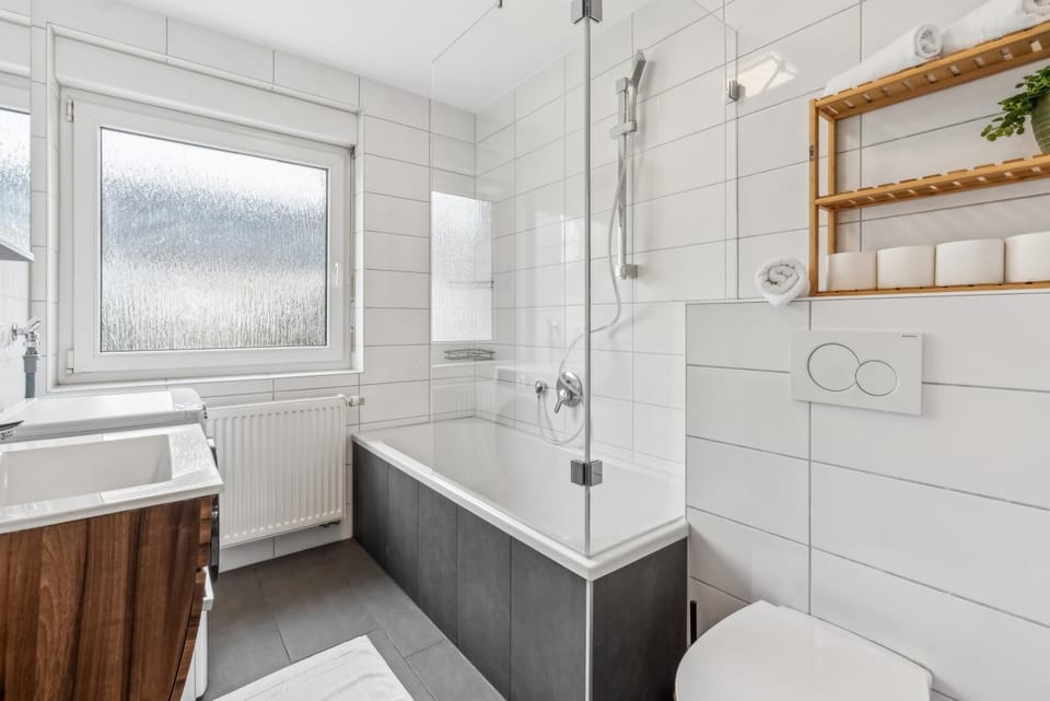 Shower, Toilet, Bathroom, Bath, hair dryier, towels, washing machine, dryer