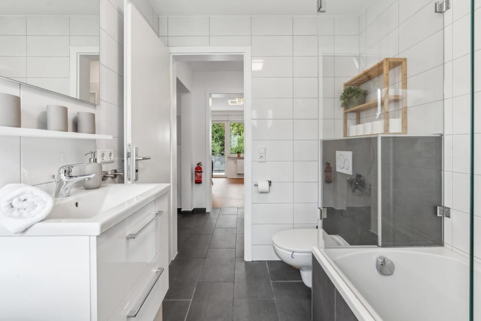 Shower, Toilet, Bathroom, hair dryier, towels