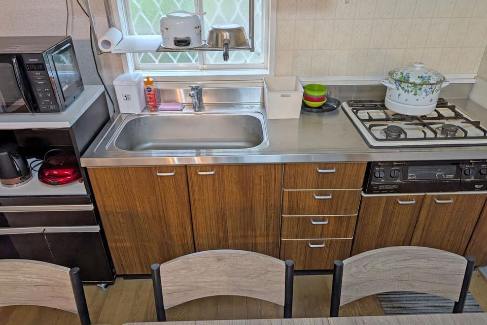 Kitchen or kitchenette, stove