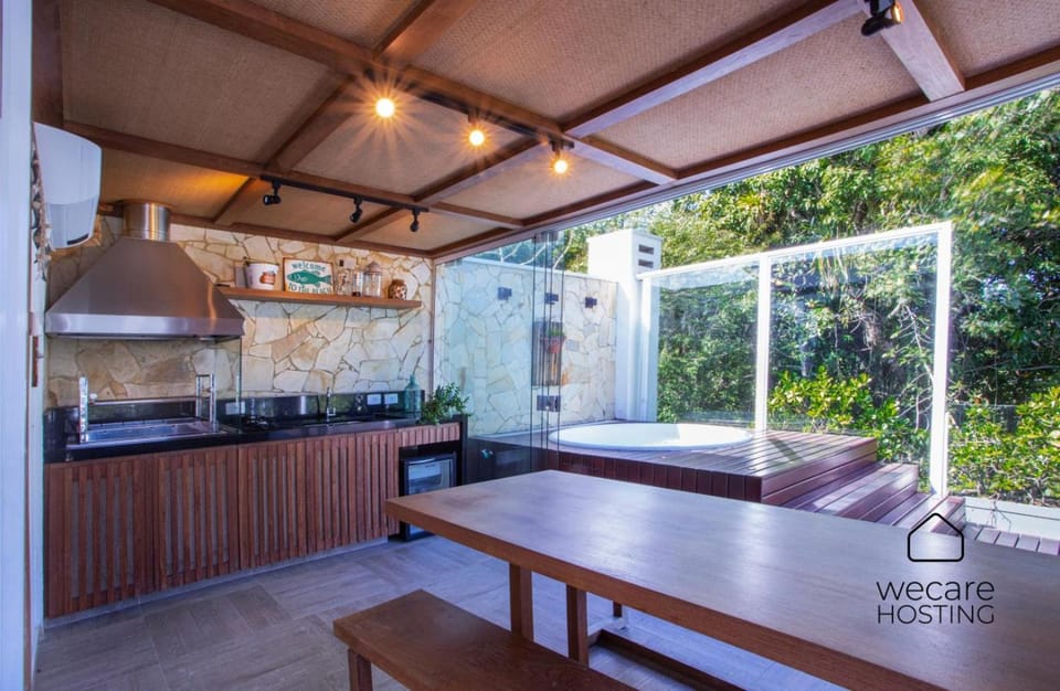 Casa com jacuzzi e rooftop - Wecare Hosting House in Bertioga