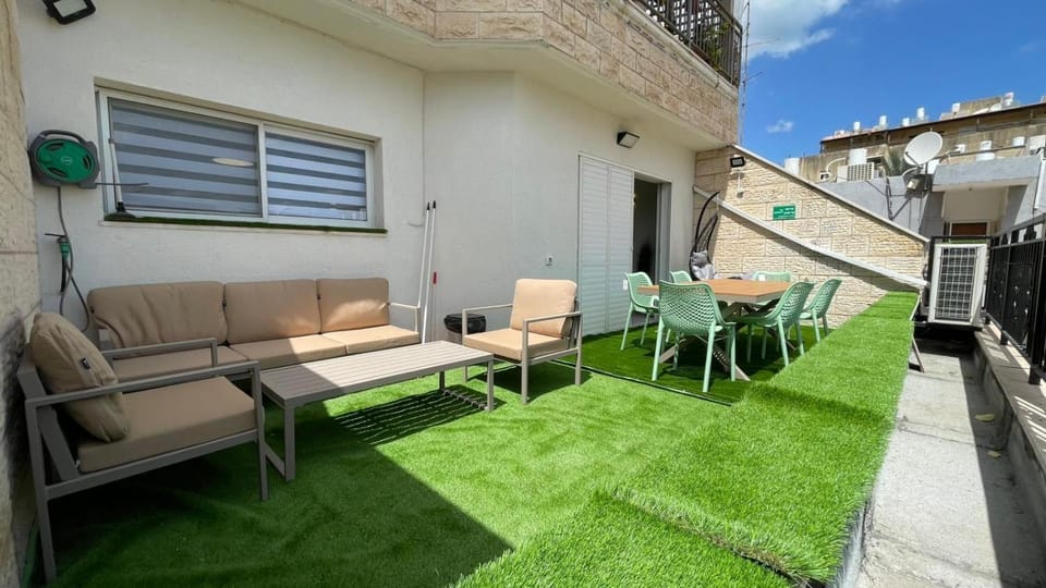 Property building, Patio, Spring, Garden, View (from property/room), Balcony/Terrace, Living room, Seating area, Garden view, sunbed